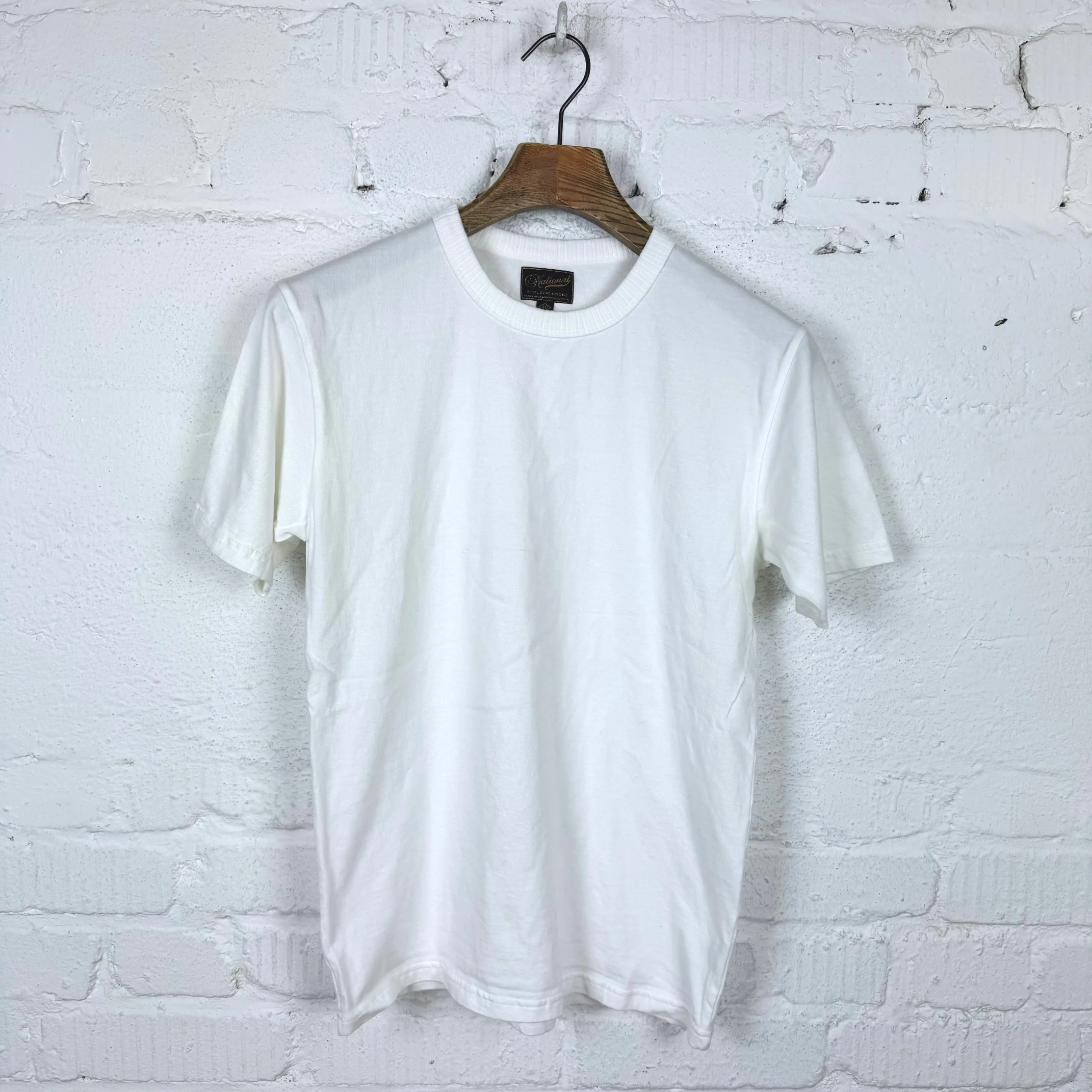 national athletic goods | track tee white
