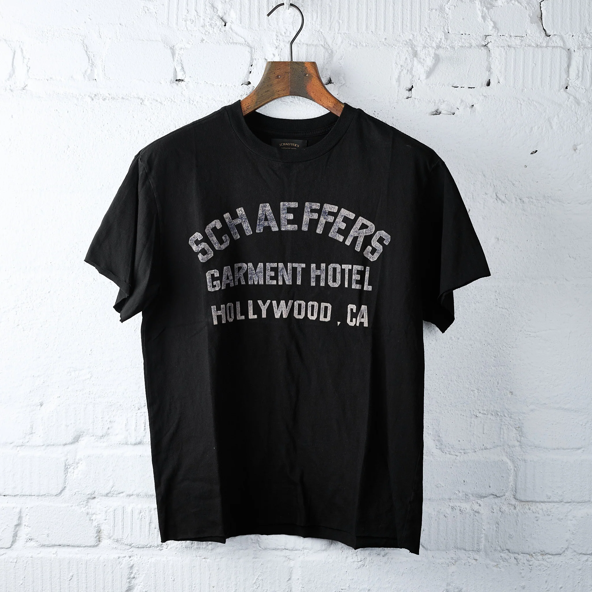 schaeffer's garment hotel | black cycle varsity drop shoulder raw edge tee