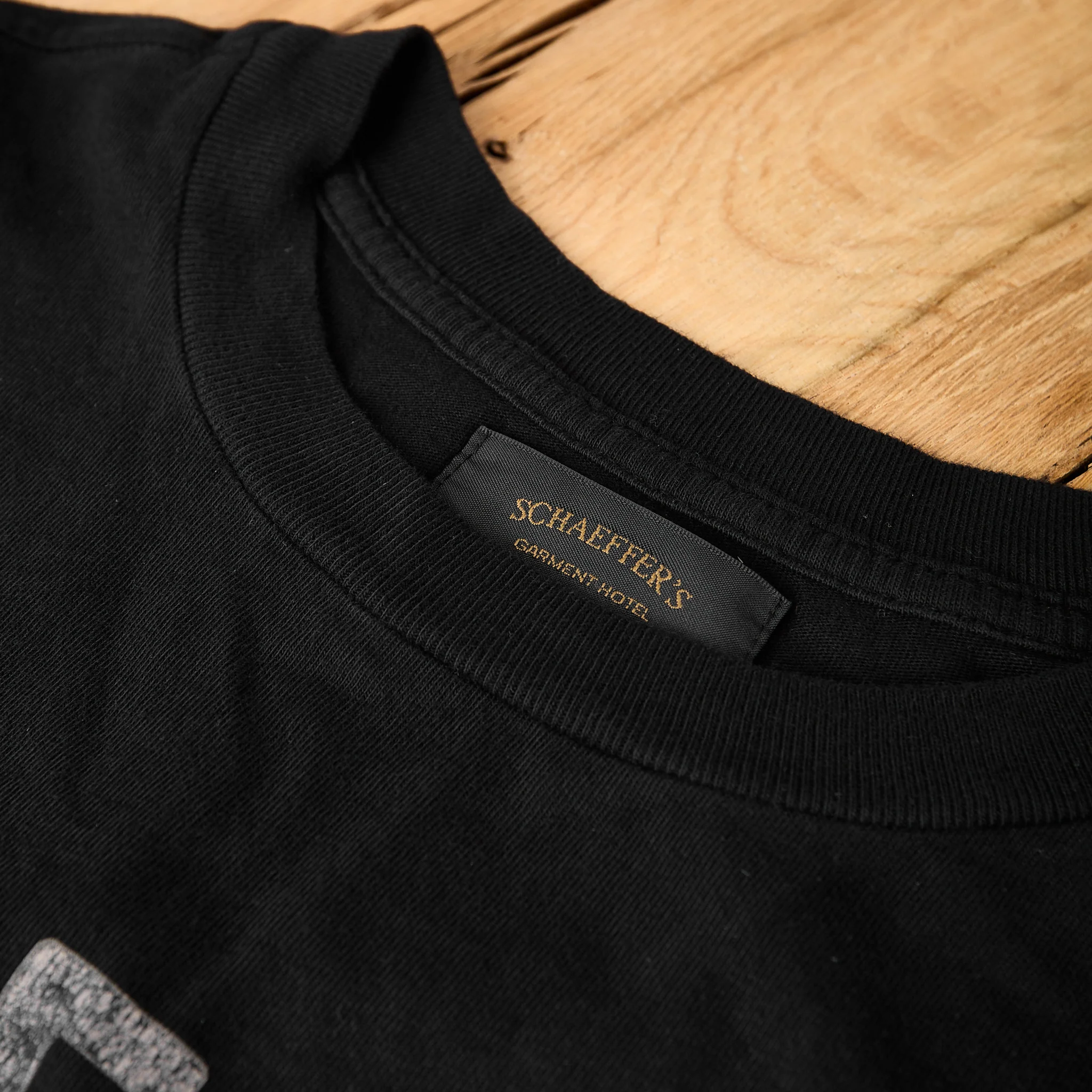 schaeffer's garment hotel | black cycle varsity drop shoulder raw edge tee - Image 4