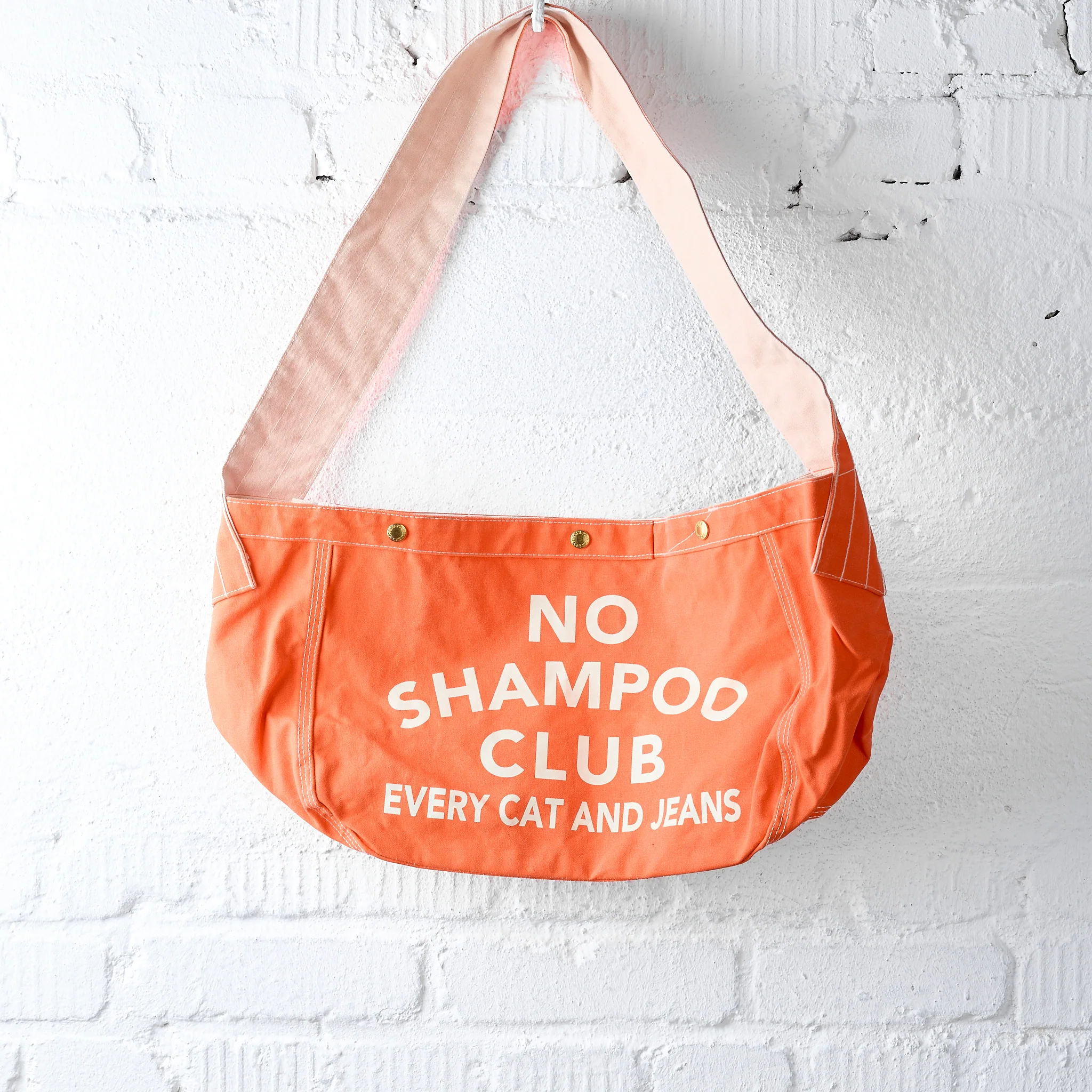 tcb | 'no shampoo club' newspaper bag - solid orange