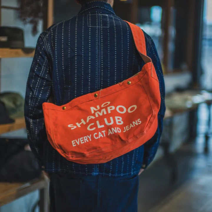 tcb | 'no shampoo club' newspaper bag - solid orange - Image 2